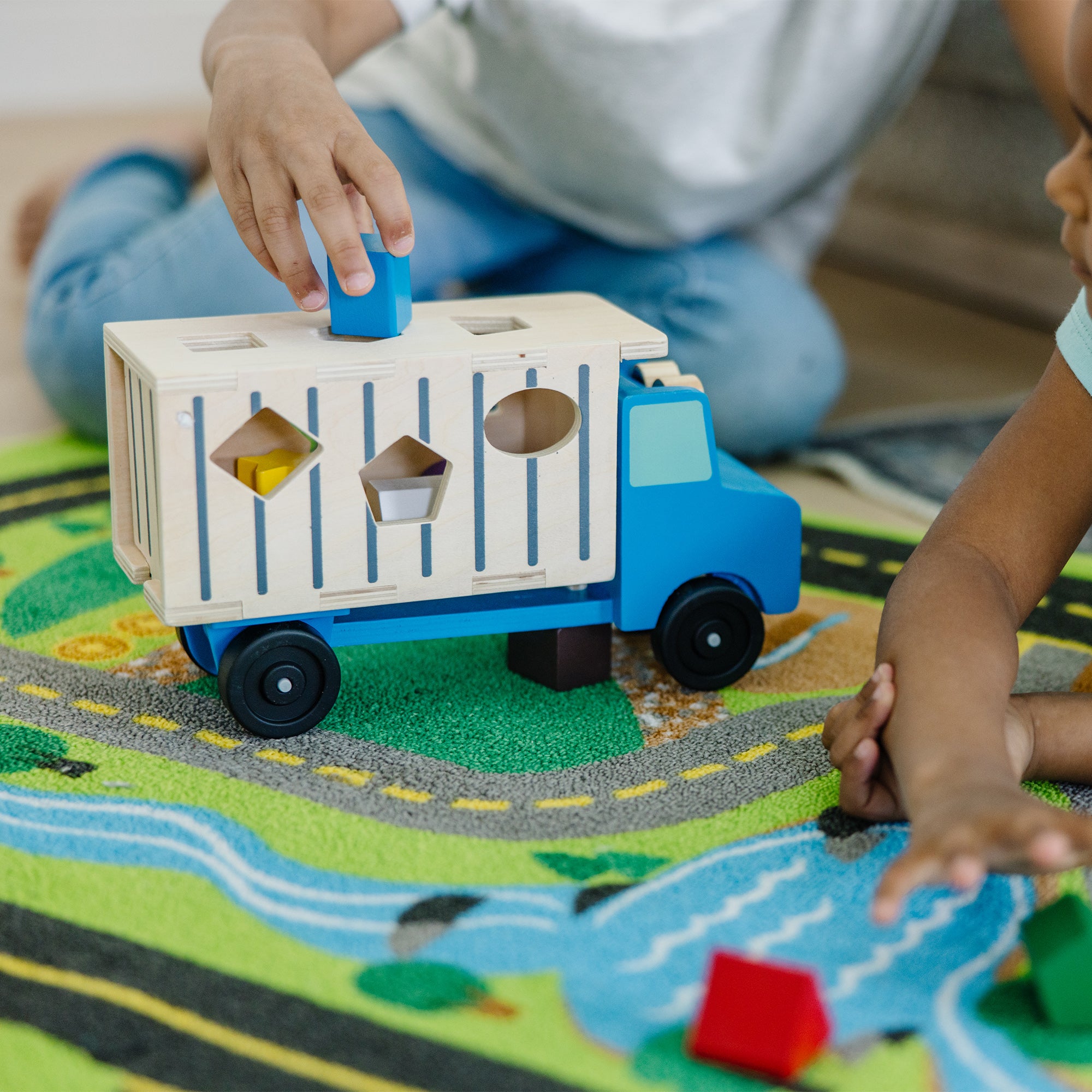 Melissa & Doug Shape-Sorting Dump Truck - Image 10